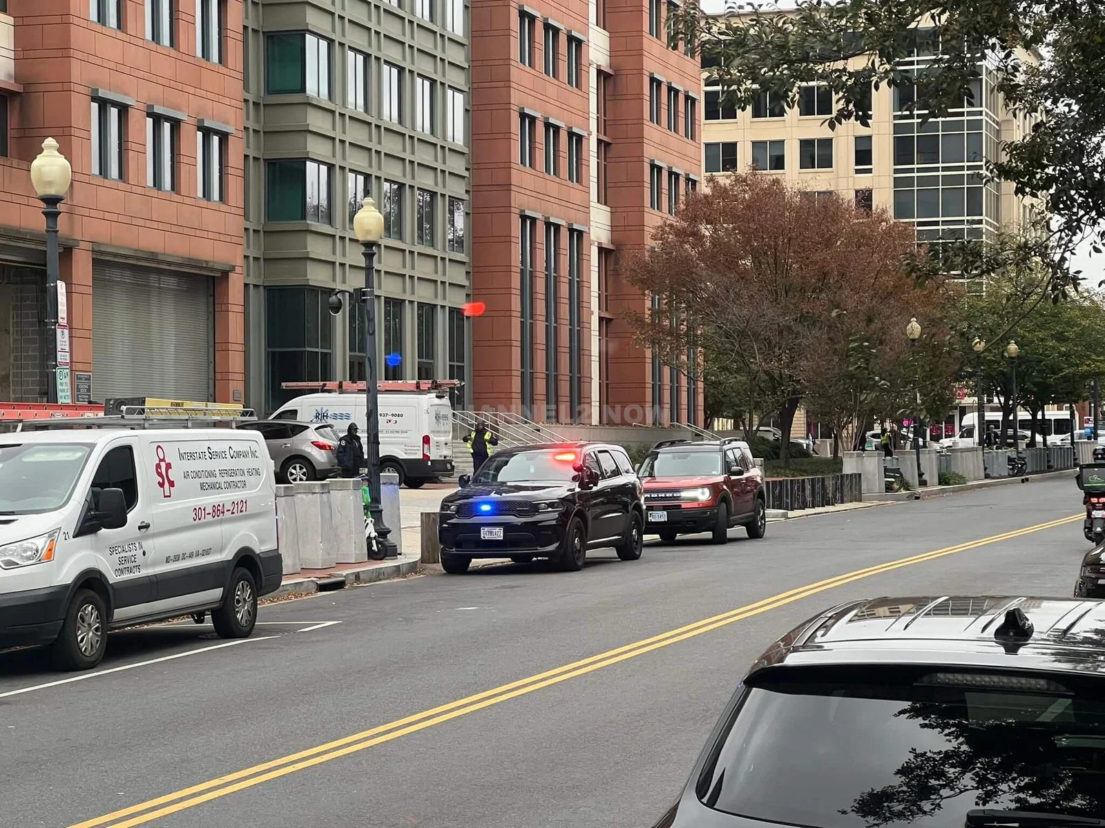 Inert Grenade Discovered in Navy Yard Prompts Evacuation Near Department of Transportation and Starbucks: Washington, DC Authorities Secure Area as Police and Emergency Responders Confirm No Active Shooter Threat